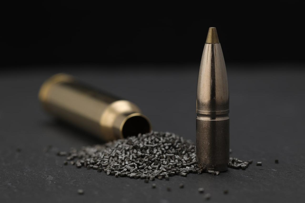 RWS Wiederladekomponenten An image of a rifle cartridge, divided into its essentials components such as case, propellant powder and projectile