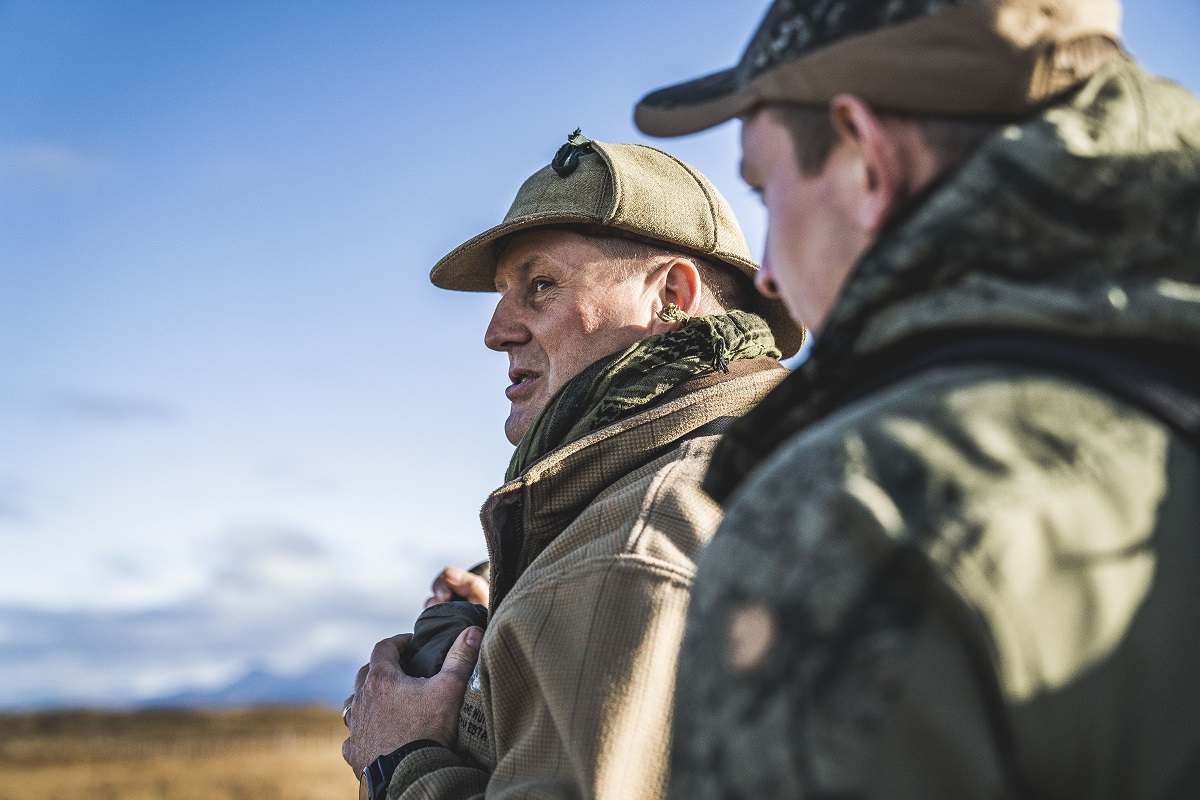 Hunting leader and hunter in the scottish highlands